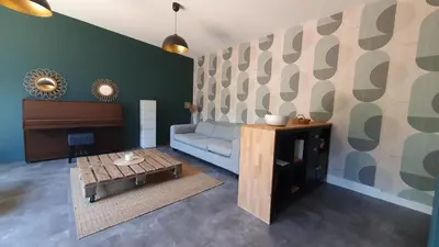 Un ou plusieurs lits dans un hébergement de l'établissement Gîte avec bain nordique dans la campagne brayonne pour 2 personnes