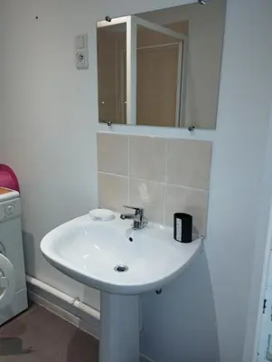 Salle de bains dans l'établissement Le Grand Large