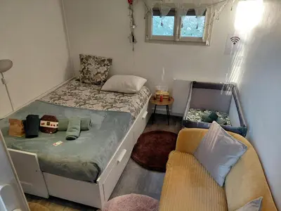 Un ou plusieurs lits dans un hébergement de l'établissement Studio promenade bord de Seine Rouen