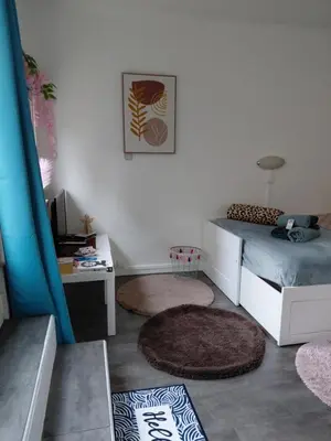 Un ou plusieurs lits dans un hébergement de l'établissement Studio promenade bord de Seine Rouen