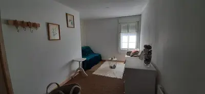 Coin salon dans l'établissement Les chambres du Val d'Eyden