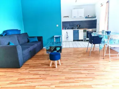 Coin salon dans l'établissement CHARMANT APPARTEMENT SUR SOTTEVILLES LES ROUEN