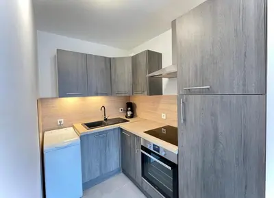 Cuisine ou kitchenette dans l'établissement Petit nid douillet