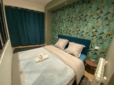 Un ou plusieurs lits dans un hébergement de l'établissement Studio avec baignoire balnéo centre de Rouen - 040