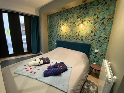 Un ou plusieurs lits dans un hébergement de l'établissement Studio avec baignoire balnéo centre de Rouen - 040