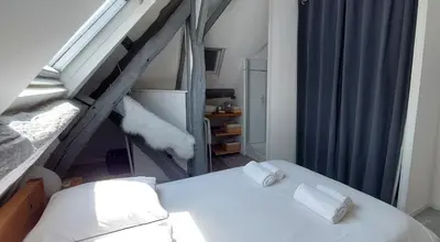 Un ou plusieurs lits dans un hébergement de l'établissement La Goélette - Entre Port & Plage - Cosy
