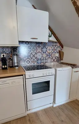 Cuisine ou kitchenette dans l'établissement La Goélette - Entre Port & Plage - Cosy