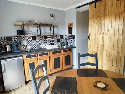 Cuisine ou kitchenette dans l'établissement Gîte équestre. Ferme des Essarts