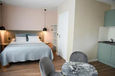 Un ou plusieurs lits dans un hébergement de l'établissement Auberge la Renaissance