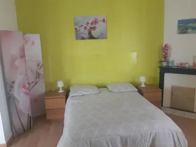 Un ou plusieurs lits dans un hébergement de l'établissement Chez Virginie