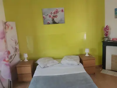 Un ou plusieurs lits dans un hébergement de l'établissement Chez Virginie