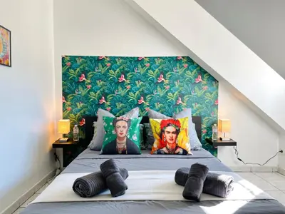 Un ou plusieurs lits dans un hébergement de l'établissement La Suite Frida, Cosy & Quiet