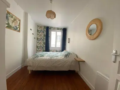 Un ou plusieurs lits dans un hébergement de l'établissement L'Abri-gîte - Appartement moderne idéalement situé en centre ville BY HOLIDIEPPE