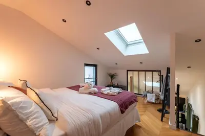 Un ou plusieurs lits dans un hébergement de l'établissement Toscana - Luxury Duplex Rouen