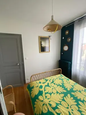 Un ou plusieurs lits dans un hébergement de l'établissement Chambre privée les Clottins dans maison