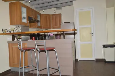 Cuisine ou kitchenette dans l'établissement La Maison de Nicole
