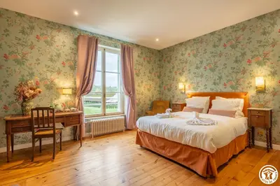 Un ou plusieurs lits dans un hébergement de l'établissement Domaine du Chateau Vert