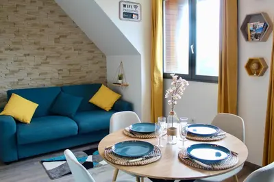 Coin salon dans l'établissement Studio Capucine - Centre ville - Jolie vue - Cosy
