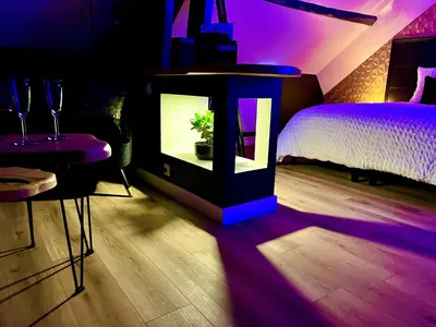 Un ou plusieurs lits dans un hébergement de l'établissement L'Intemporel Suite Spa