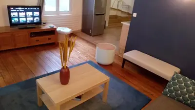 Télévision ou salle de divertissement dans l'établissement Loft en duplex avec vue sur plage et chenal