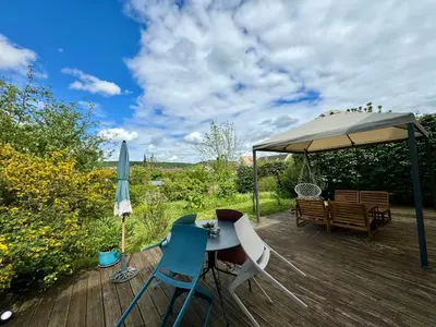 Jardin de l'établissement La Mandragora - Maison avec jardin et poêle à bois