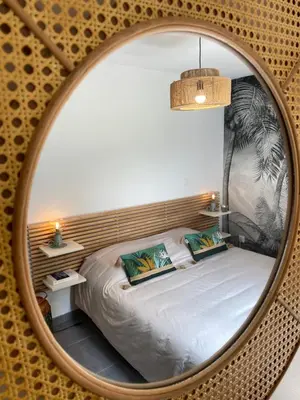 Un ou plusieurs lits dans un hébergement de l'établissement La Maison des Vacances, à deux pas de la mer.