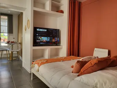Un ou plusieurs lits dans un hébergement de l'établissement Appart' Terracotta - Champs Élysées 20 mn - NETFLIX