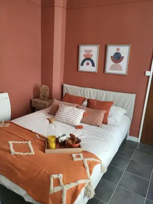 Un ou plusieurs lits dans un hébergement de l'établissement Appart' Terracotta - Champs Élysées 20 mn - NETFLIX