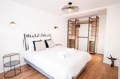 Un ou plusieurs lits dans un hébergement de l'établissement L'air Du Temps - appartement cosy au Tréport
