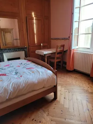 Un ou plusieurs lits dans un hébergement de l'établissement Chambre chez l'habitant 3