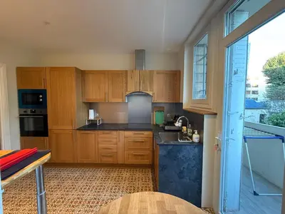 Cuisine ou kitchenette dans l'établissement Les appartements de Chantilly - gare