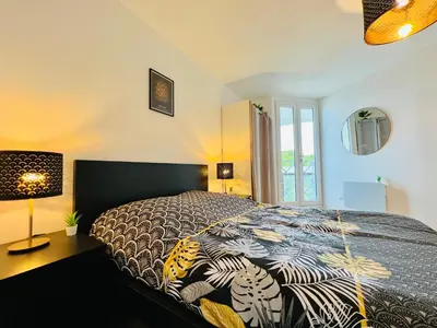 Un ou plusieurs lits dans un hébergement de l'établissement Appartement luxueux et cosy