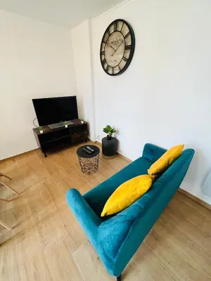 Télévision ou salle de divertissement dans l'établissement Appartement luxueux et cosy