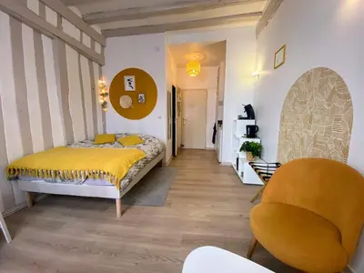 Un ou plusieurs lits dans un hébergement de l'établissement Joli studio hyper centre