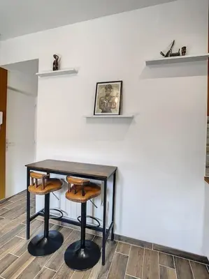 Télévision ou salle de divertissement dans l'établissement STUDIO GARE AMIENS TOUT ÉQUIPÉ NETFLIX WIFI 2PERS