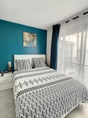 Un ou plusieurs lits dans un hébergement de l'établissement STUDIO COSY HYPER CENTRE GARE AMIENS WIFI NETFLIX 2 PERS