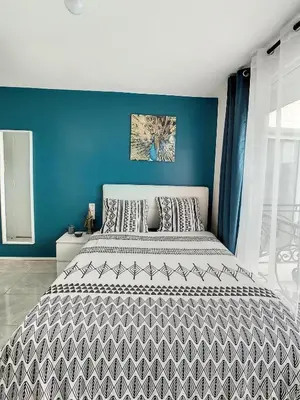 Un ou plusieurs lits dans un hébergement de l'établissement STUDIO COSY HYPER CENTRE GARE AMIENS WIFI NETFLIX 2 PERS