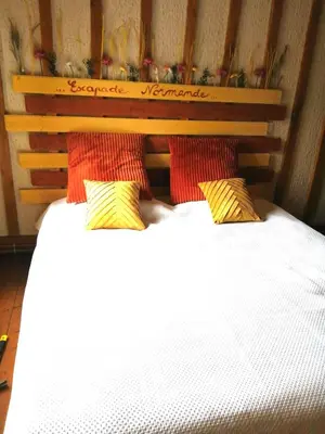 Un ou plusieurs lits dans un hébergement de l'établissement Escapade Normande SPA