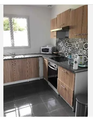 Cuisine ou kitchenette dans l'établissement Les coteaux vue mer