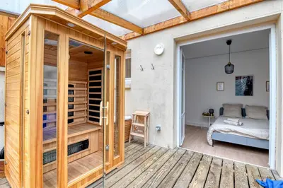 Un ou plusieurs lits dans un hébergement de l'établissement Glamour Chic en hyper centre - Wifi - Sauna pour 2 - MyLittleStay