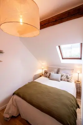 Un ou plusieurs lits dans un hébergement de l'établissement Appt cosy coeur historique+park, 5mn gare Vernon