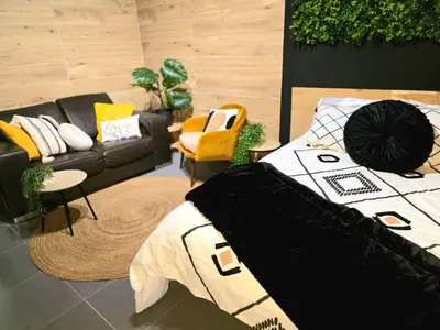 Coin salon dans l'établissement Homelove Spa