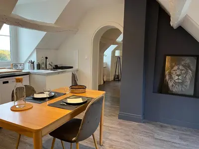 Coin salon dans l'établissement Appartement avec terrasse en plein cœur de Vernon