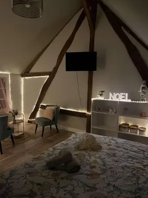 Coin salon dans l'établissement Les Gites de l'Herperie