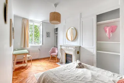 Un ou plusieurs lits dans un hébergement de l'établissement Ambiance Jungle Rouen Centre - MyLittleStay