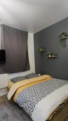 Un ou plusieurs lits dans un hébergement de l'établissement Studio confortable au cœur de Rouen