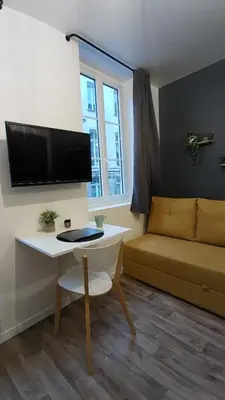 Télévision ou salle de divertissement dans l'établissement Studio confortable au cœur de Rouen