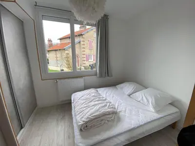 Un ou plusieurs lits dans un hébergement de l'établissement Maison de ville