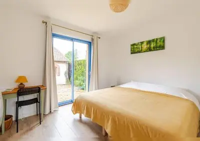Un ou plusieurs lits dans un hébergement de l'établissement Chambre privée avec sauna pour deux