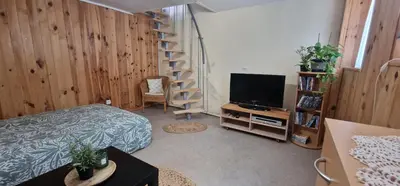 Télévision ou salle de divertissement dans l'établissement L'air du large